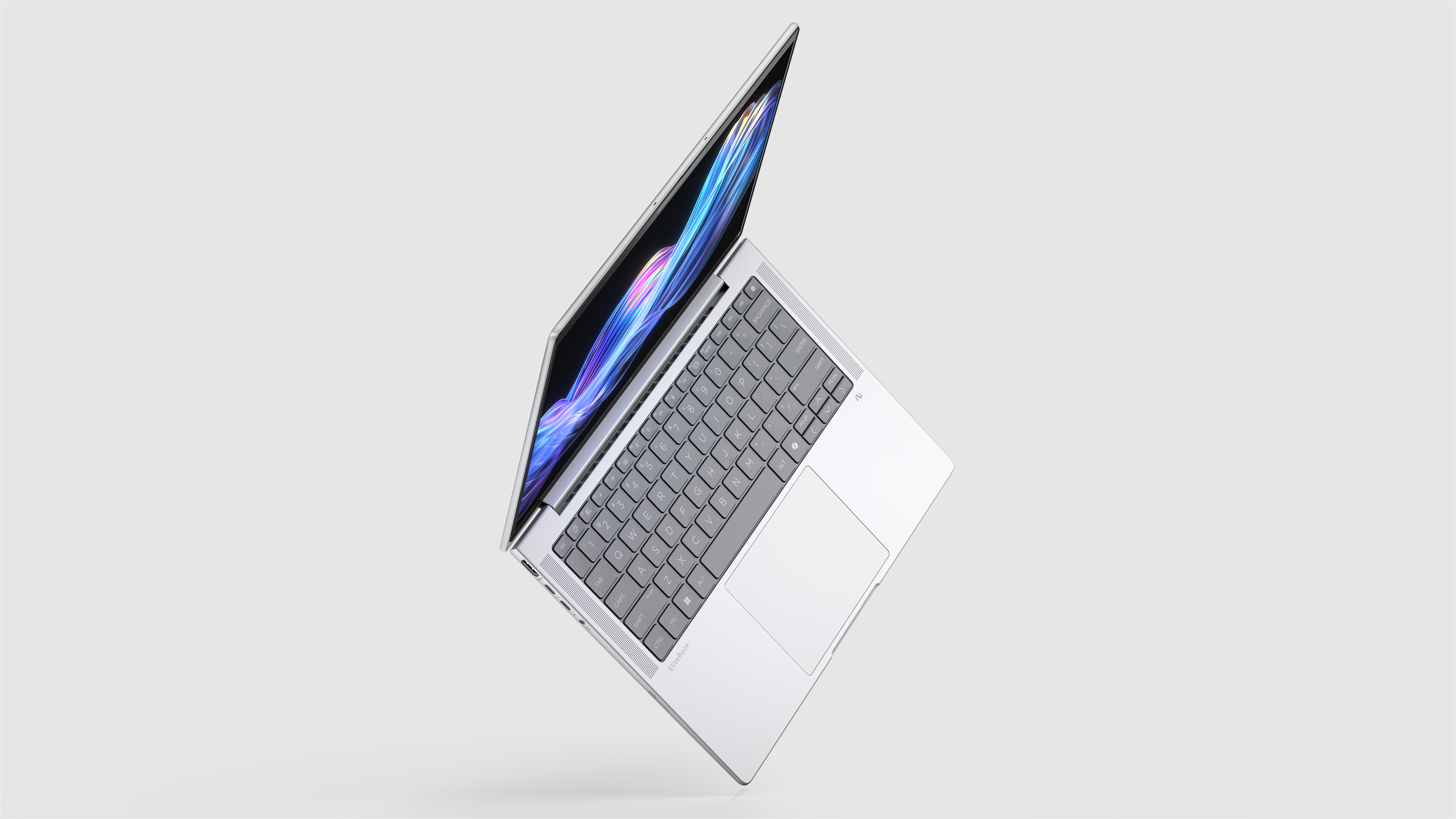 HP_EliteBook_X_G1i_14inch_Notebook_Next_Gen_AI_PC_GlacierSilver_Hero_AHS_VisID_GrayBG_Dancing_M2922112