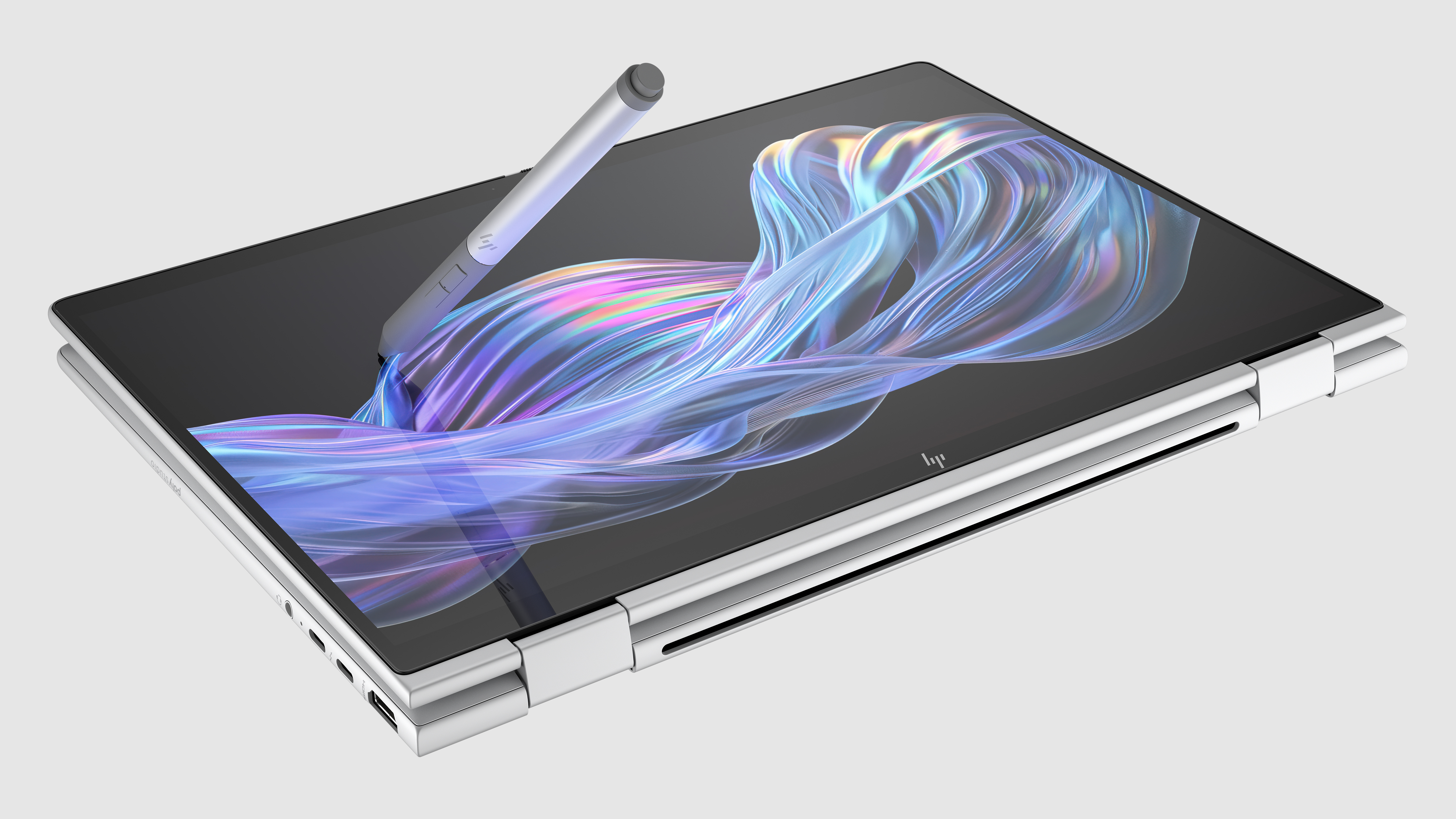 HP_EliteBook_X_Flip_G1i_14-inch_Notebook_Next_Gen_AI_PC_X360_GlacierSilver_Hero_AHS_VisID_GrayBG_TabletStylus_M2922103